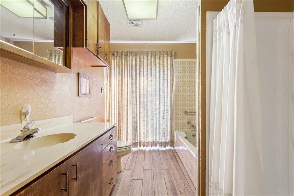 1487 Middleton Road Mart, TX 76664 - Photo 28 of 40 a bathroom with a sink and a mirror