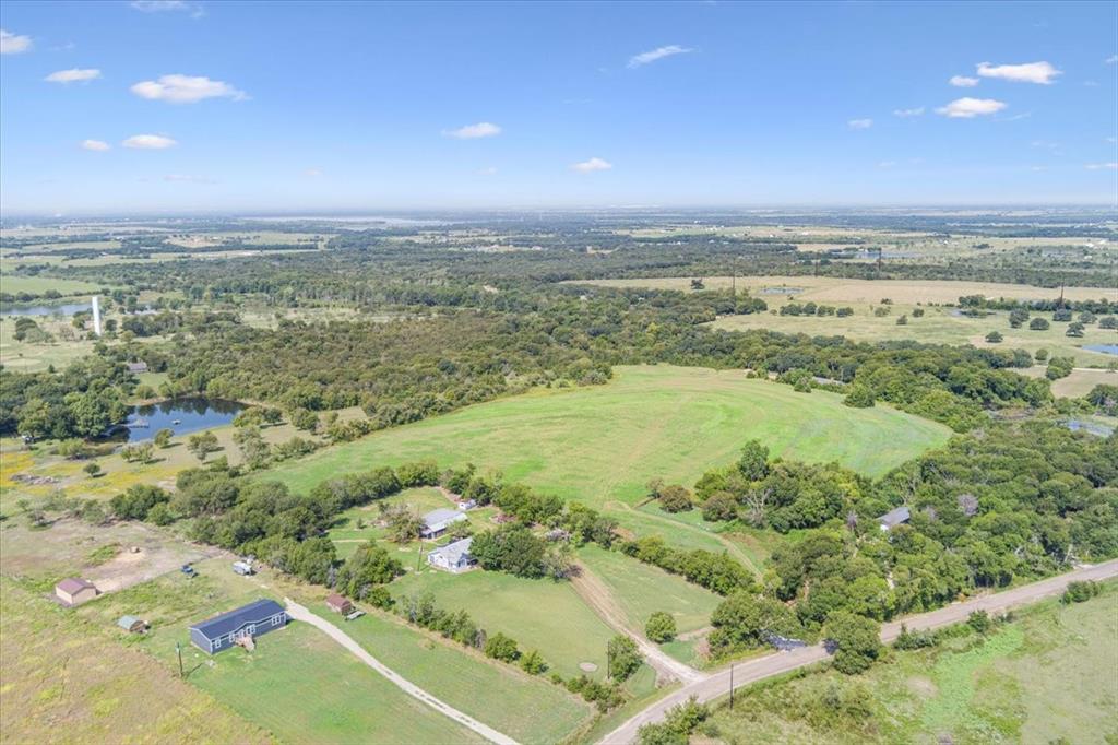 1487 Middleton Road Mart, TX 76664 - Photo 3 of 40 a view of a city with an ocean beach