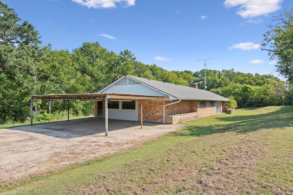 1487 Middleton Road Mart, TX 76664 - Photo 5 of 40 a house with a yard