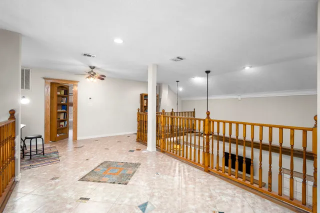 a view of a livingroom with furniture and a window
