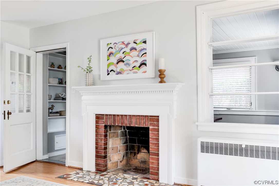 5115 Sylvan Road Richmond, VA 23225 - Photo 11 of 37 a living room with furniture and a fireplace