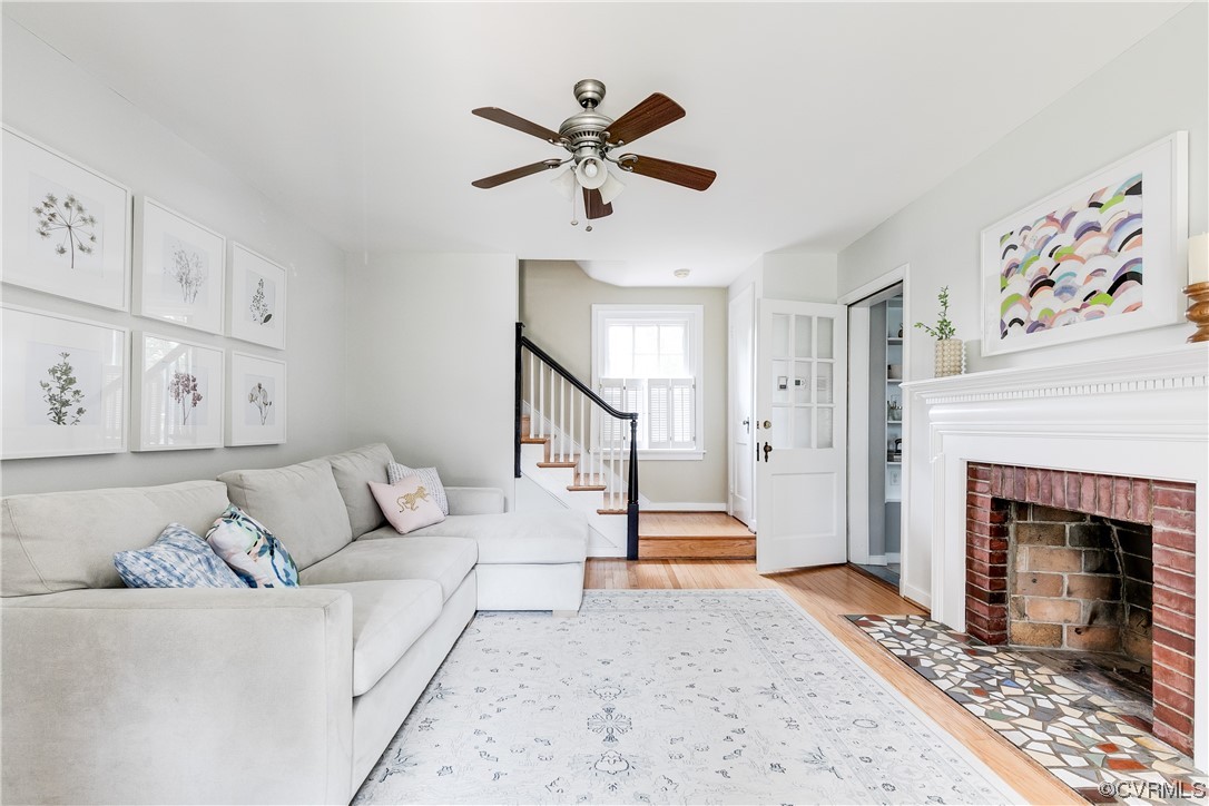 5115 Sylvan Road Richmond, VA 23225 - Photo 12 of 37 a living room with furniture and a fireplace