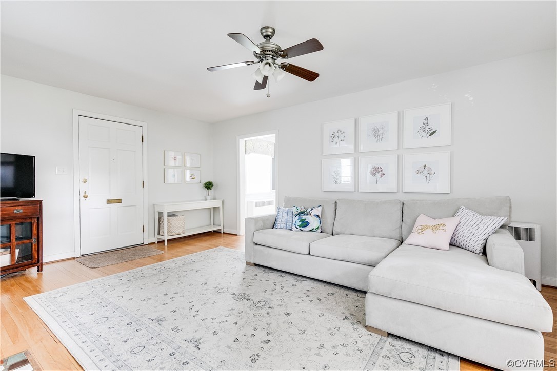 5115 Sylvan Road Richmond, VA 23225 - Photo 13 of 37 a living room with furniture and a flat screen tv