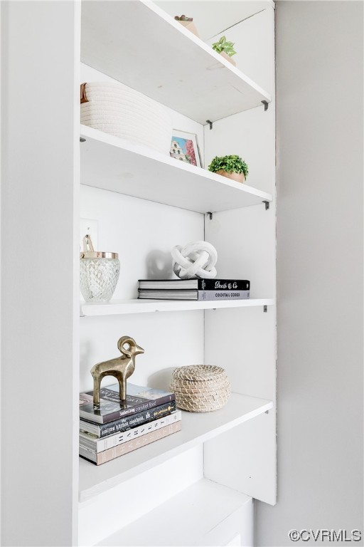 5115 Sylvan Road Richmond, VA 23225 - Photo 14 of 37 a bathroom with a sink and a mirror