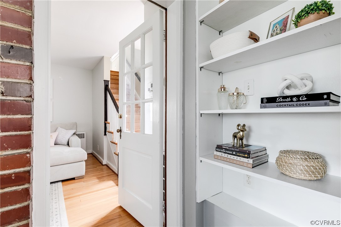 5115 Sylvan Road Richmond, VA 23225 - Photo 19 of 37 a kitchen with white cabinets and appliances