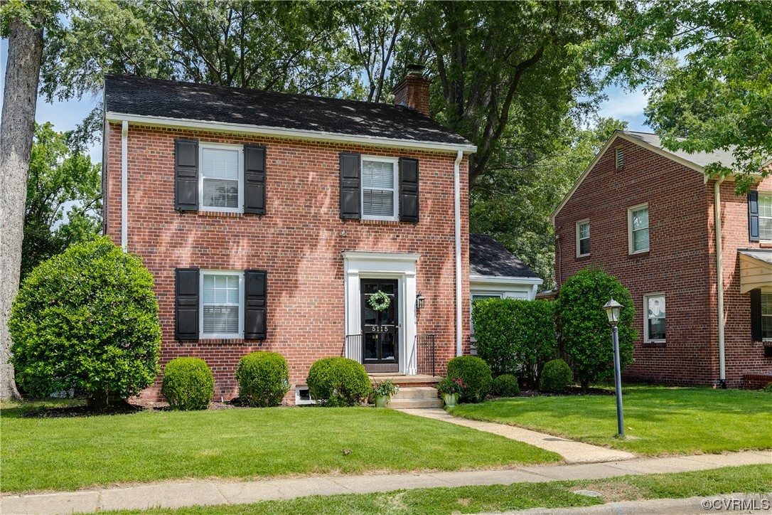 5115 Sylvan Road Richmond, VA 23225 - Photo 3 of 37 a front view of a house with a yard