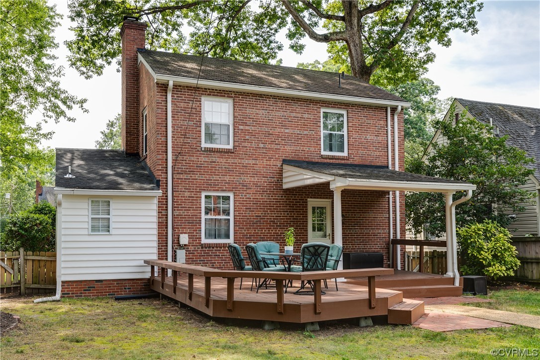 5115 Sylvan Road Richmond, VA 23225 - Photo 6 of 37 a view of a house with a yard deck and a large tree