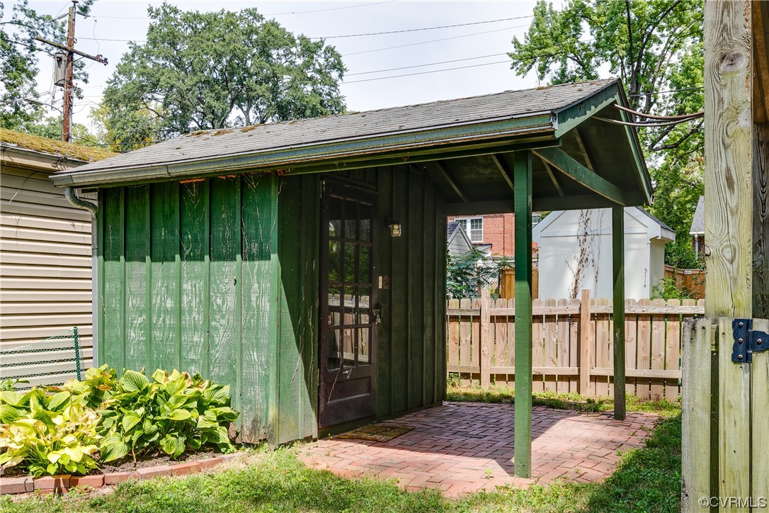 5115 Sylvan Road Richmond, VA 23225 - Photo 9 of 37 a front view of a house with a yard