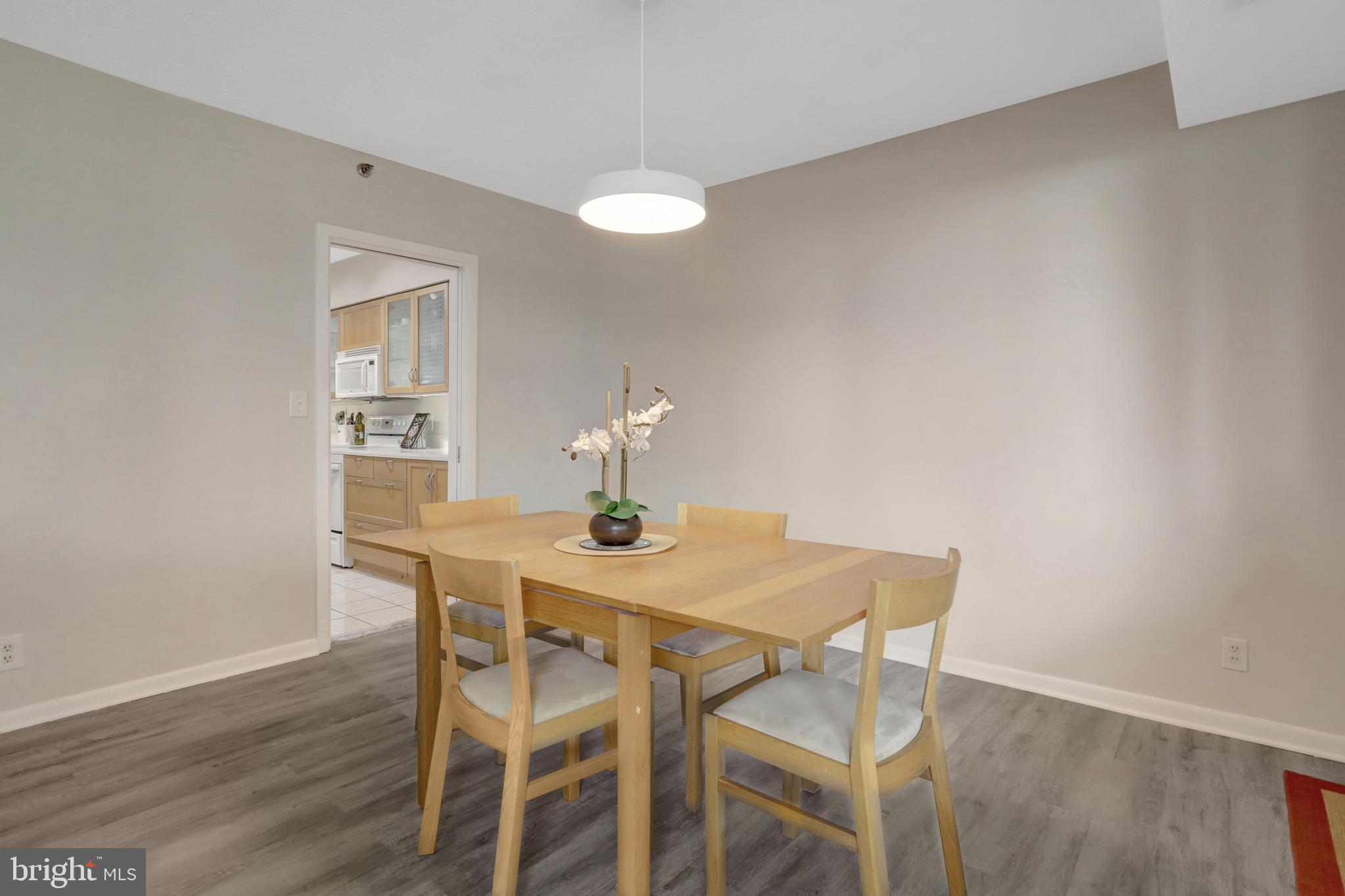 5501 Seminary Road, Unit 514S Falls Church, VA 22041 - Photo 14 of 72 a view of a dining room with furniture and wooden floor