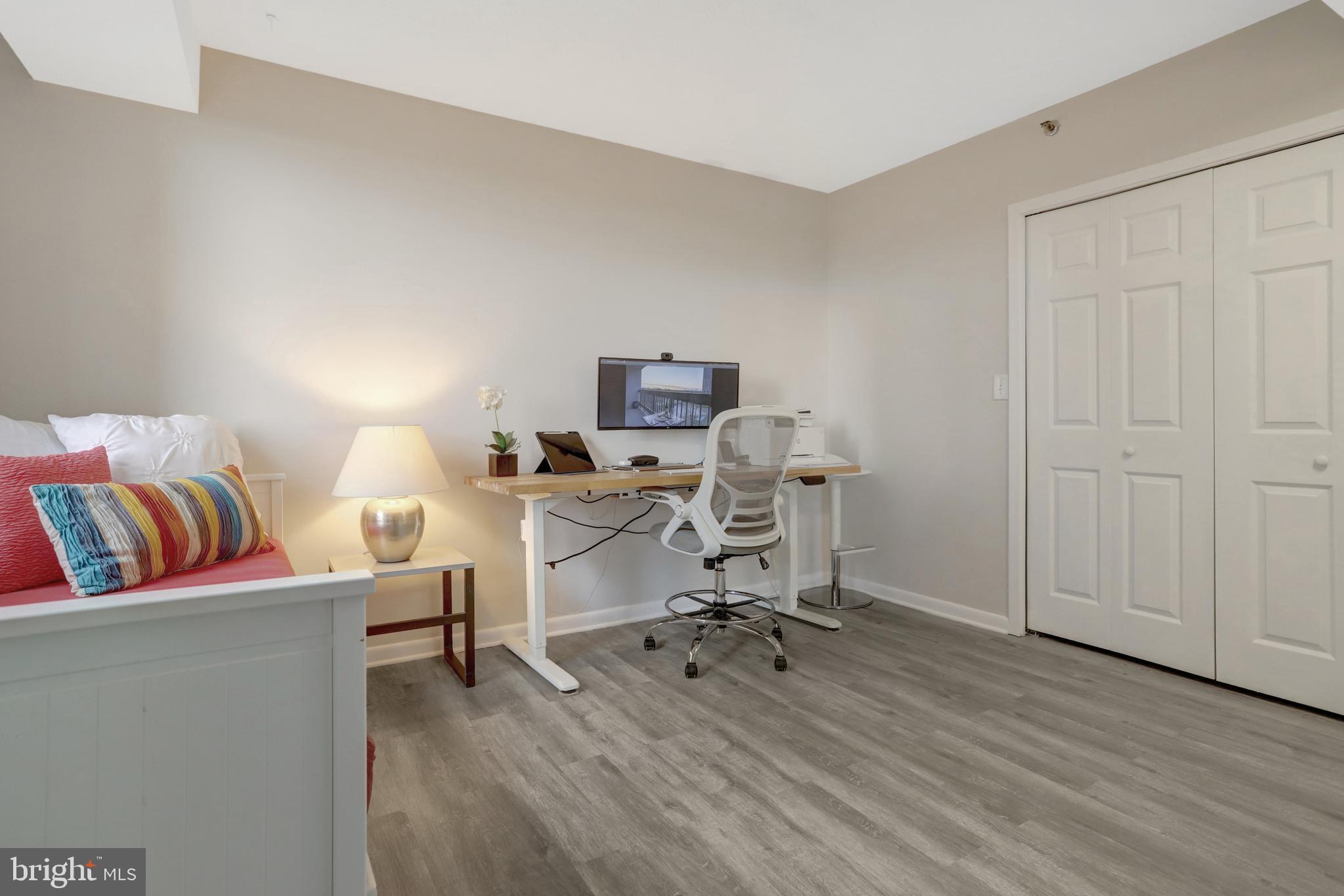 5501 Seminary Road, Unit 514S Falls Church, VA 22041 - Photo 22 of 72 a view of a workspace with furniture and wooden floor