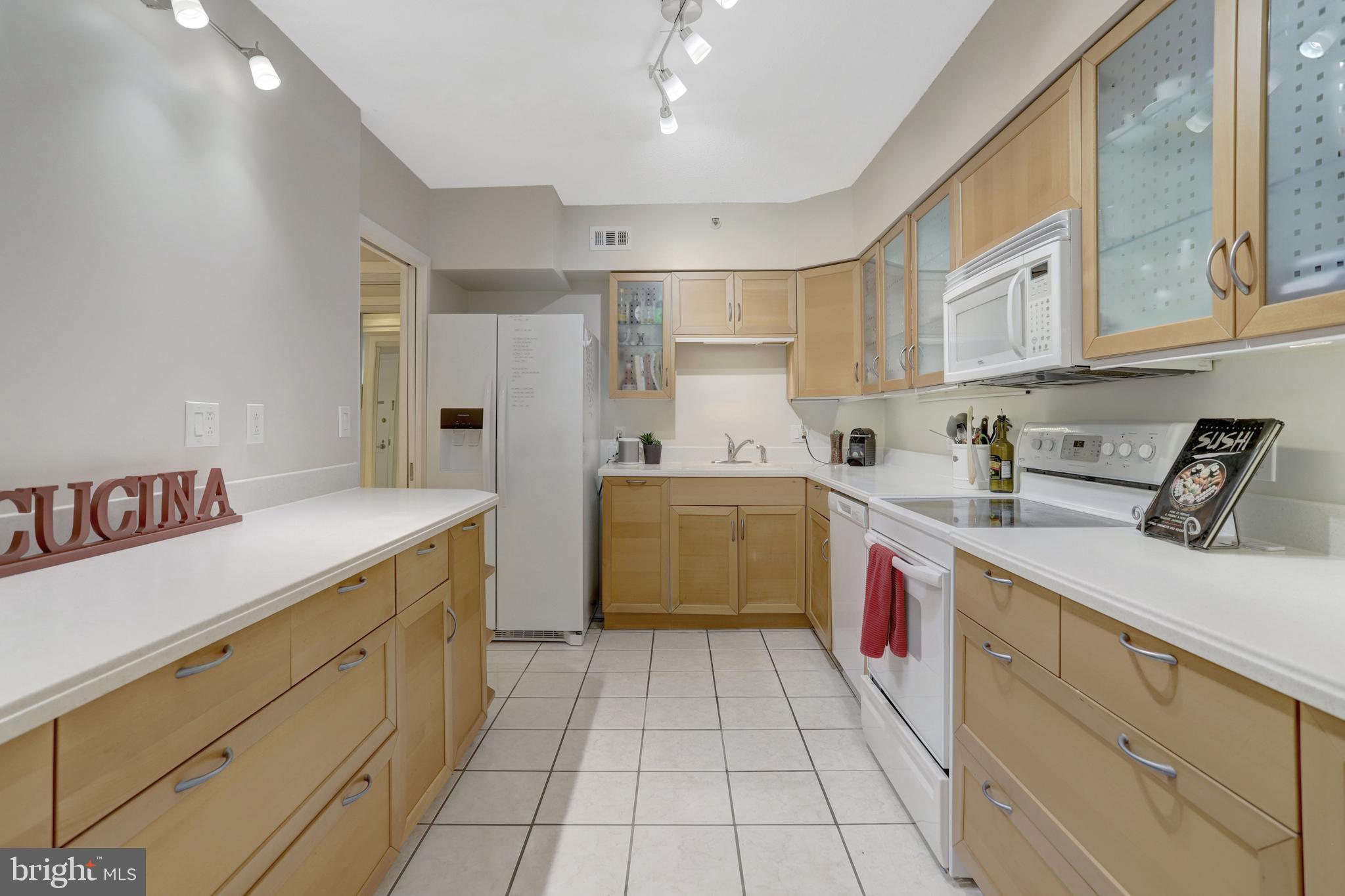 5501 Seminary Road, Unit 514S Falls Church, VA 22041 - Photo 10 of 72 a kitchen with a sink cabinets and window