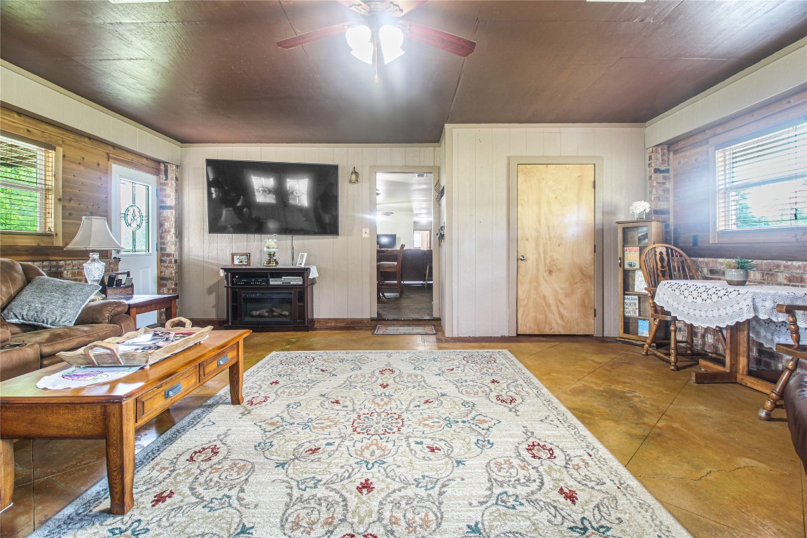 10704 Buls Road East Bernard, TX 77435 - Photo 23 of 49 a bedroom with a bed and a flat screen tv