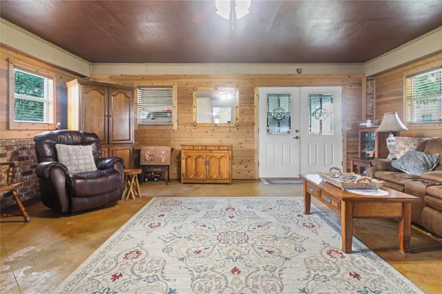 a bedroom with bed and window