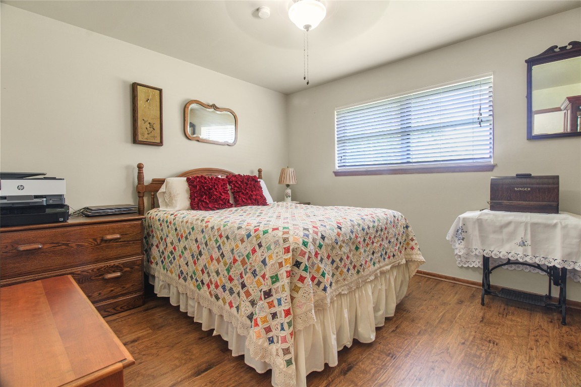 10704 Buls Road East Bernard, TX 77435 - Photo 35 of 49 a bedroom with bed and window