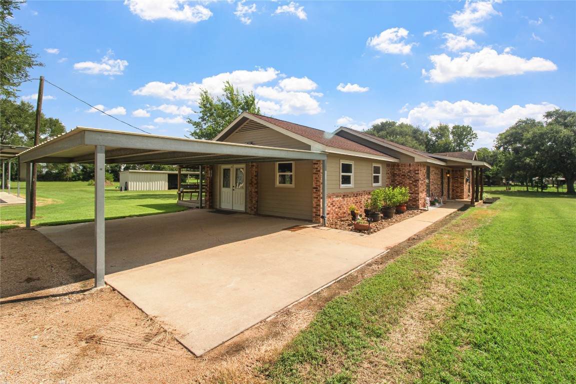 10704 Buls Road East Bernard, TX 77435 - Photo 5 of 49 a front view of house with yard and green space