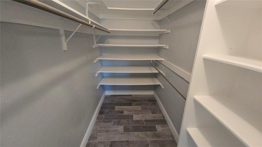 3755 South School Avenue, Unit 42 Sarasota, FL 34239 - Photo 13 of 22 a view of staircase with white walls and a window