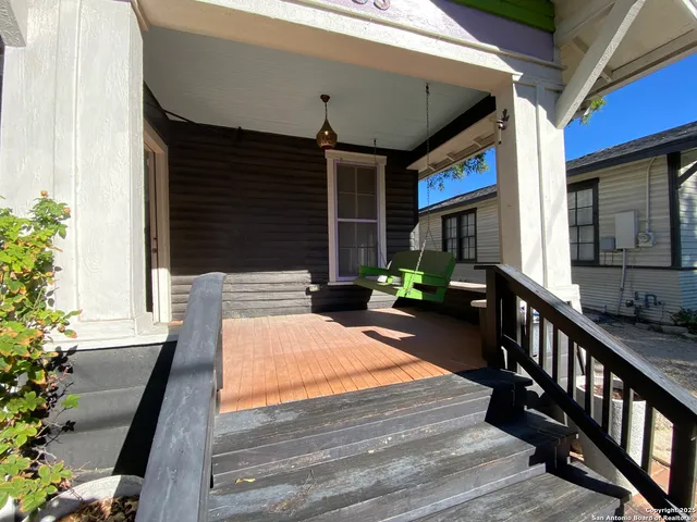 a view of an house with porch and wooden floor