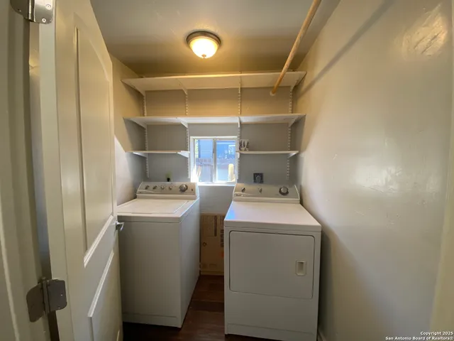 a utility room with dryer and washer