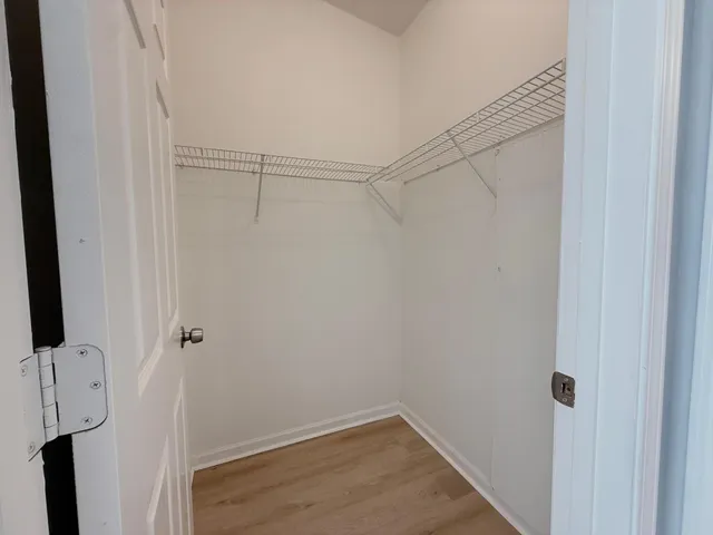 a view of a room with racks on the wall