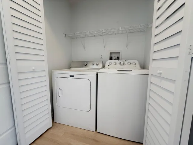 a utility room with dryer and washer