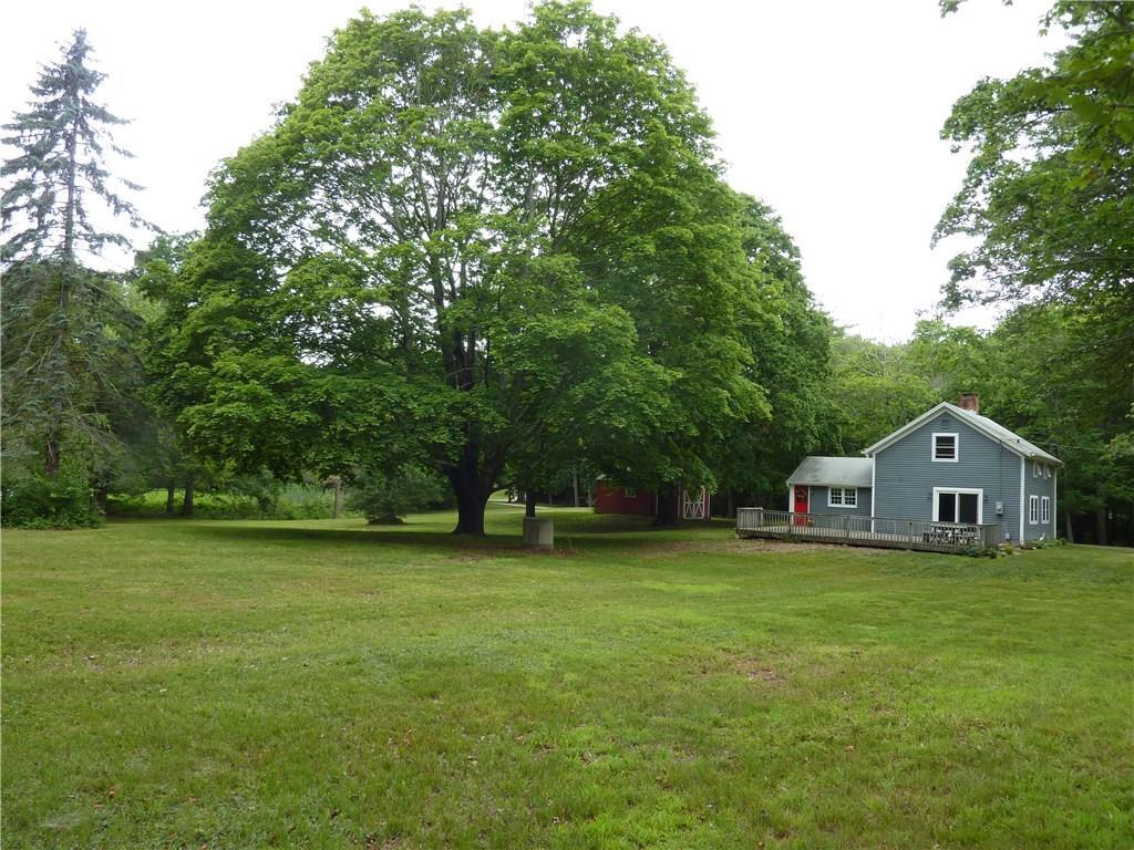60 Buttonball Road Old Lyme, CT 06371 - Photo 1 of 1 a view of a house with a big yard