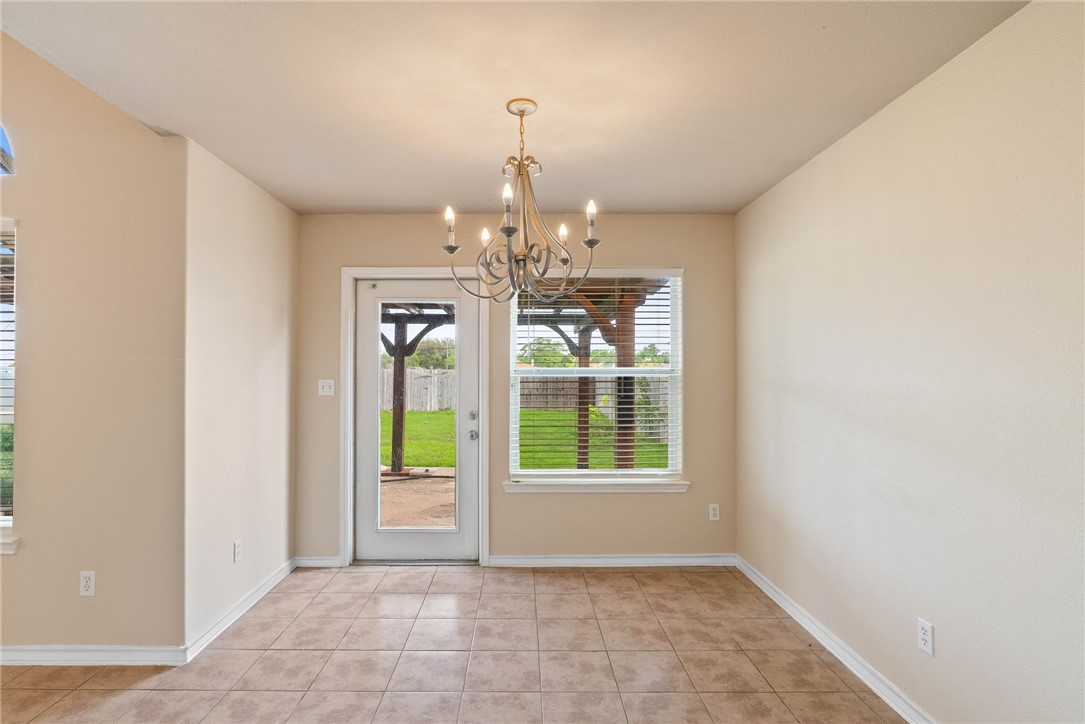 6606 Riding Wind Drive Corpus Christi, TX 78414 - Photo 5 of 15 a view of an empty room with a window