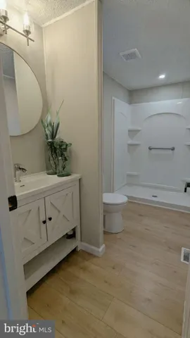 a bathroom with a bathtub and sink