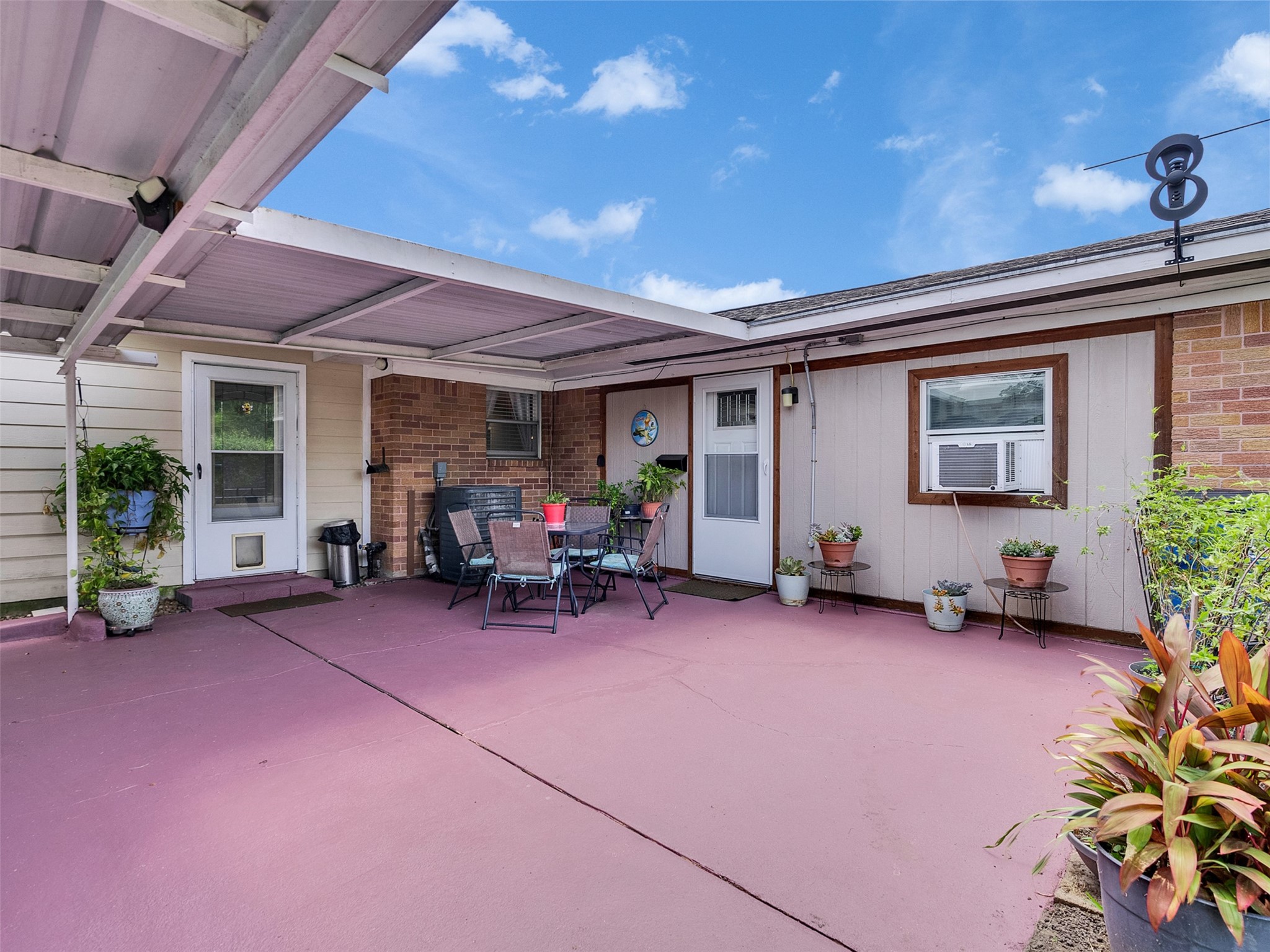 14310 Henry Road Houston, TX 77060 - Photo 25 of 34 Patio area to back door of house and apartment