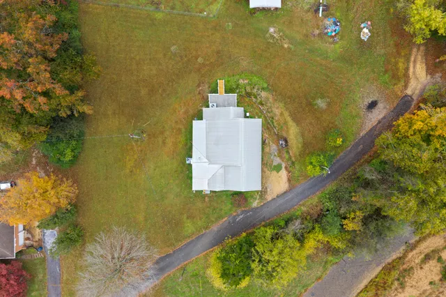 a view of swimming pool with seating area