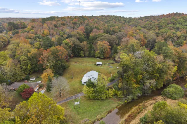 a view of a lake in middle of the town