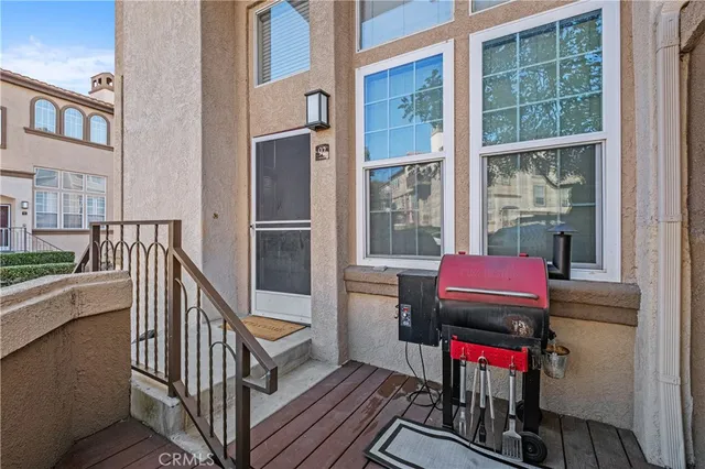 a view of a balcony with chairs