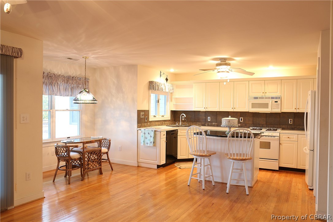 97 Barnes View Lane Kilmarnock, VA 22482 - Photo 17 of 20 View of kitchen from family room.