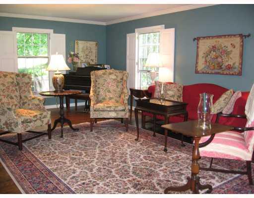 140 Witherow Road Bell Acres, PA 15143 - Photo 2 of 8 Living Room. The original shutters highlight the five windows in the living room. The Pella windows have wood muntins and mullions, but still are easy to clean.