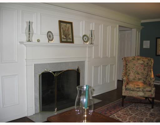 140 Witherow Road Bell Acres, PA 15143 - Photo 3 of 8 Living Room. The fireplace wall is detailed with a ledge, moldings and marble. Closets, one seen at far right, for storing china, etc., separate the living and dining rooms. All rooms in this home have hardwood floors, except the family room which is carpeted.