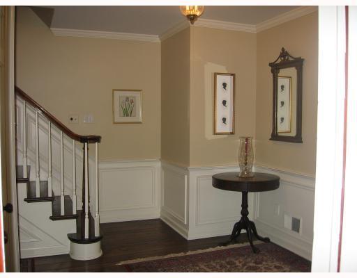140 Witherow Road Bell Acres, PA 15143 - Photo 4 of 8 Other. A neutral color in the entry is enhanced by the crisp white wainscoting and dark flooring. A hallway to the left leads to the powder room and eat-in kitchen. The family room may be entered from the hall or the kitchen, but can be closed off from visitors.