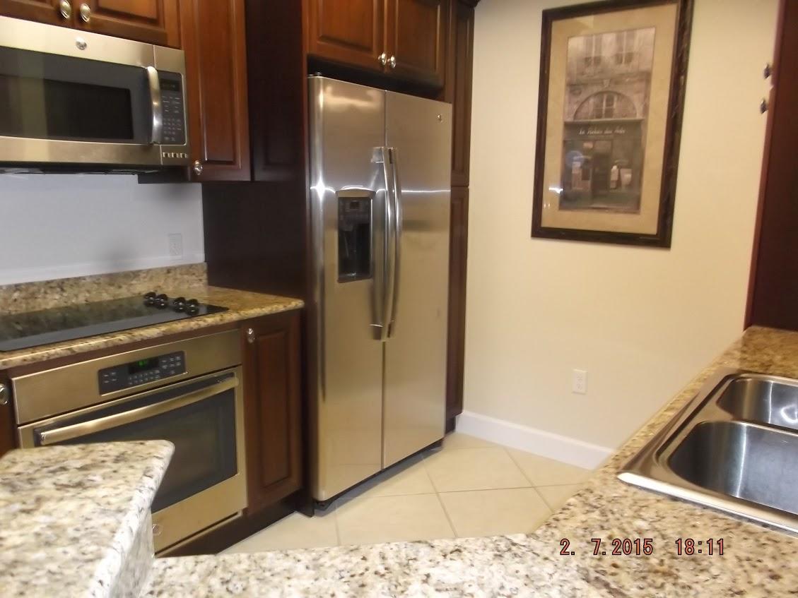 1690 Renaissance Commons Boulevard, Unit 1424 Boynton Beach, FL 33426 - Photo 3 of 31 kitchen 2