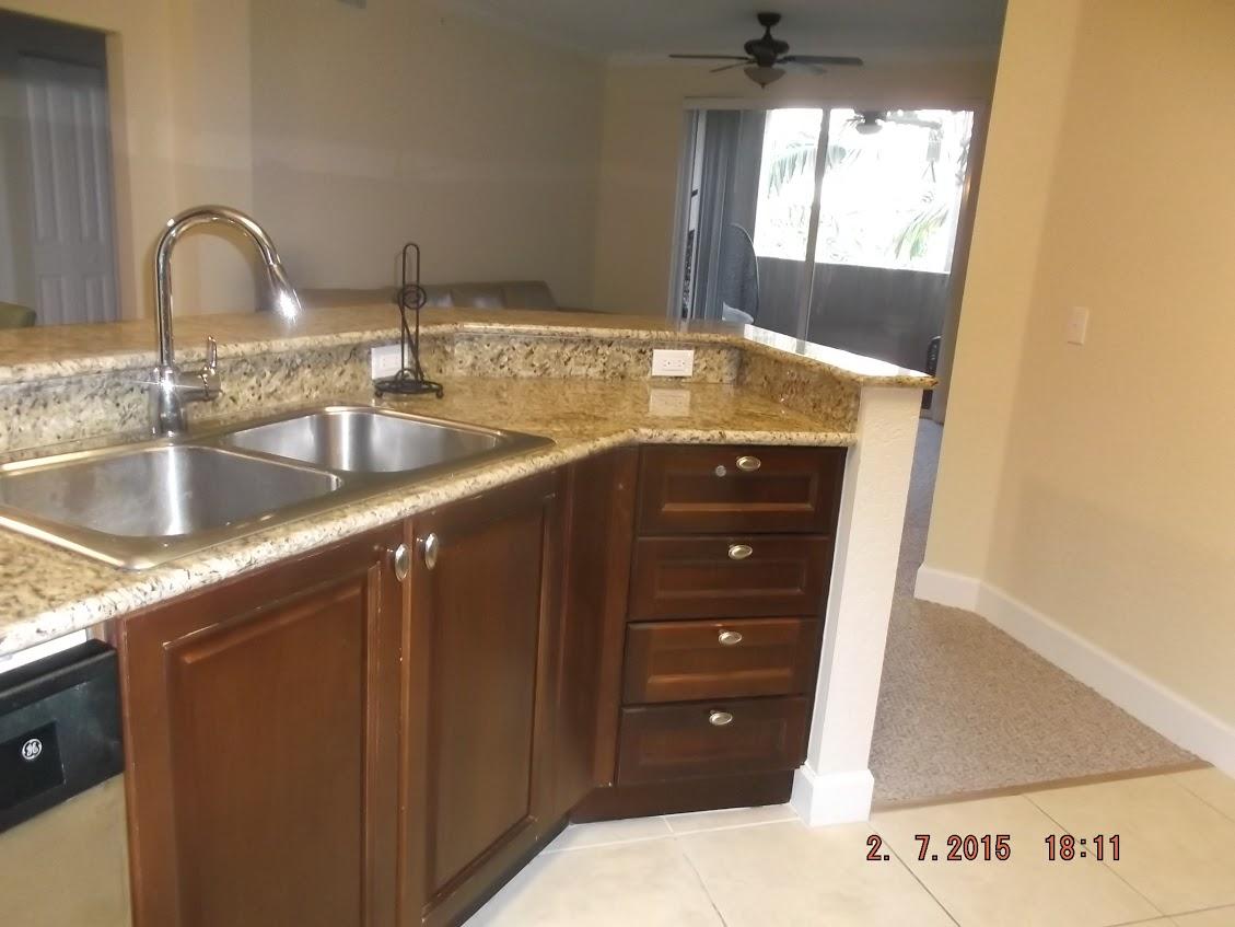 1690 Renaissance Commons Boulevard, Unit 1424 Boynton Beach, FL 33426 - Photo 4 of 31 kitchen 3