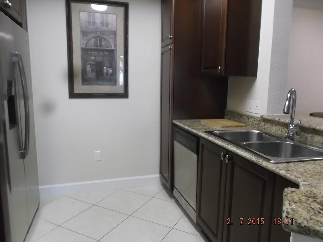 1690 Renaissance Commons Boulevard, Unit 1424 Boynton Beach, FL 33426 - Photo 7 of 31 kitchen