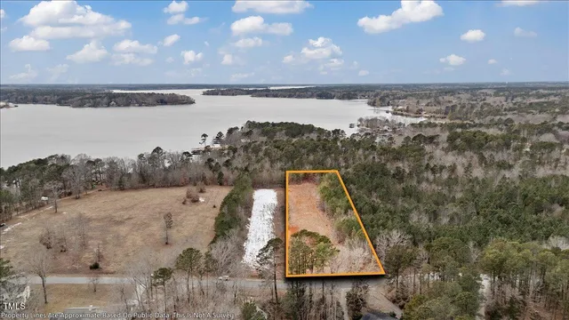 a view of a yard covered in snow