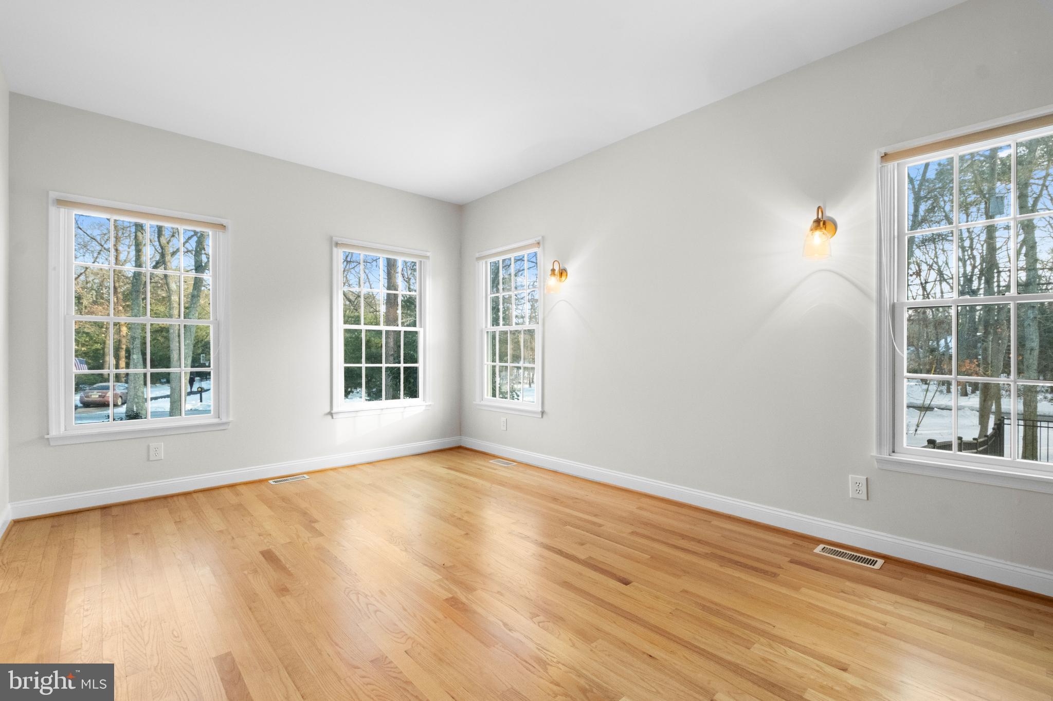 1 Braddocks Mill Road Medford, NJ 08055 - Photo 11 of 61 a view of an empty room with wooden floor and a window
