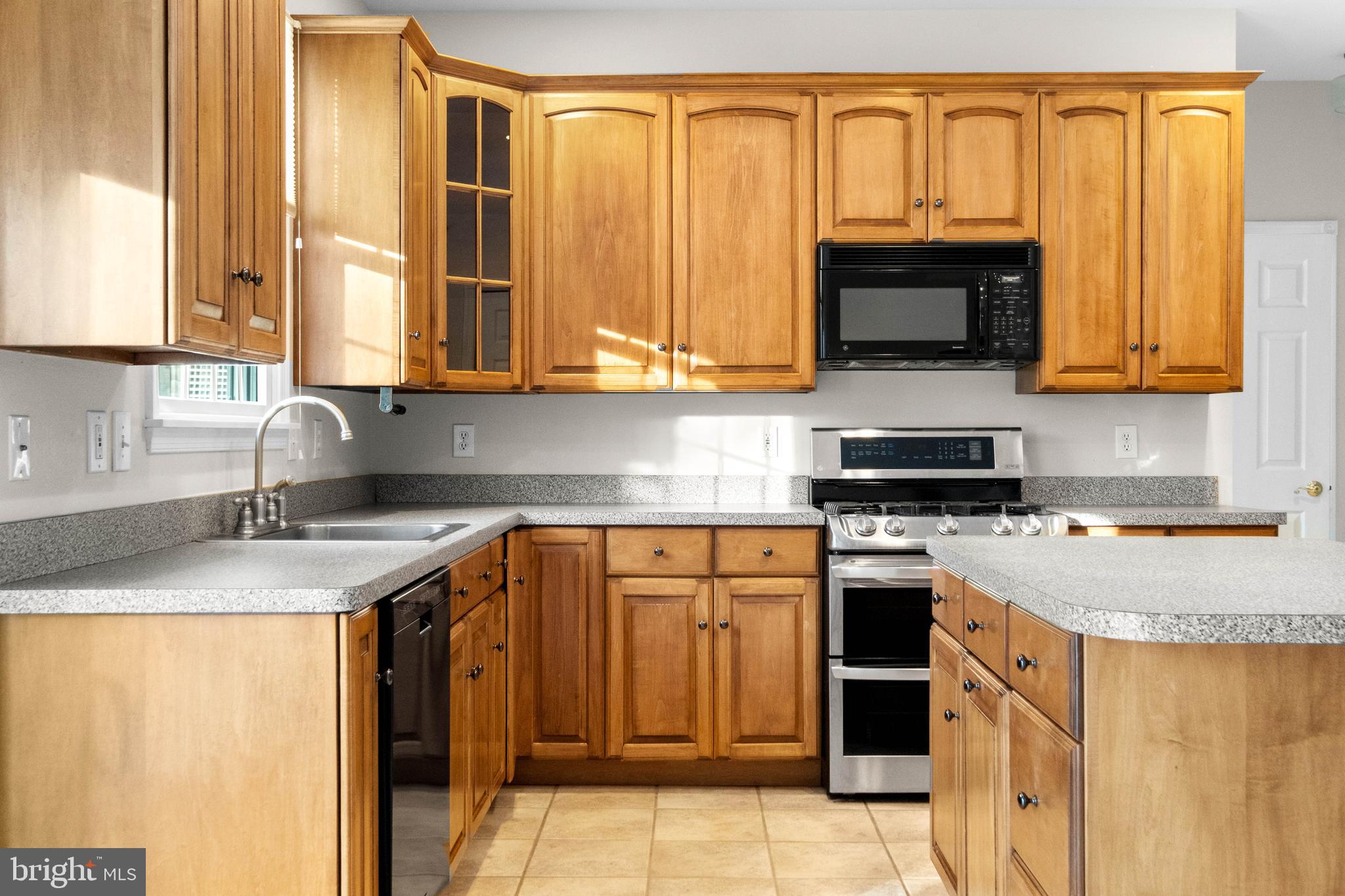 1 Braddocks Mill Road Medford, NJ 08055 - Photo 15 of 61 a kitchen with stainless steel appliances granite countertop a stove a sink and a microwave