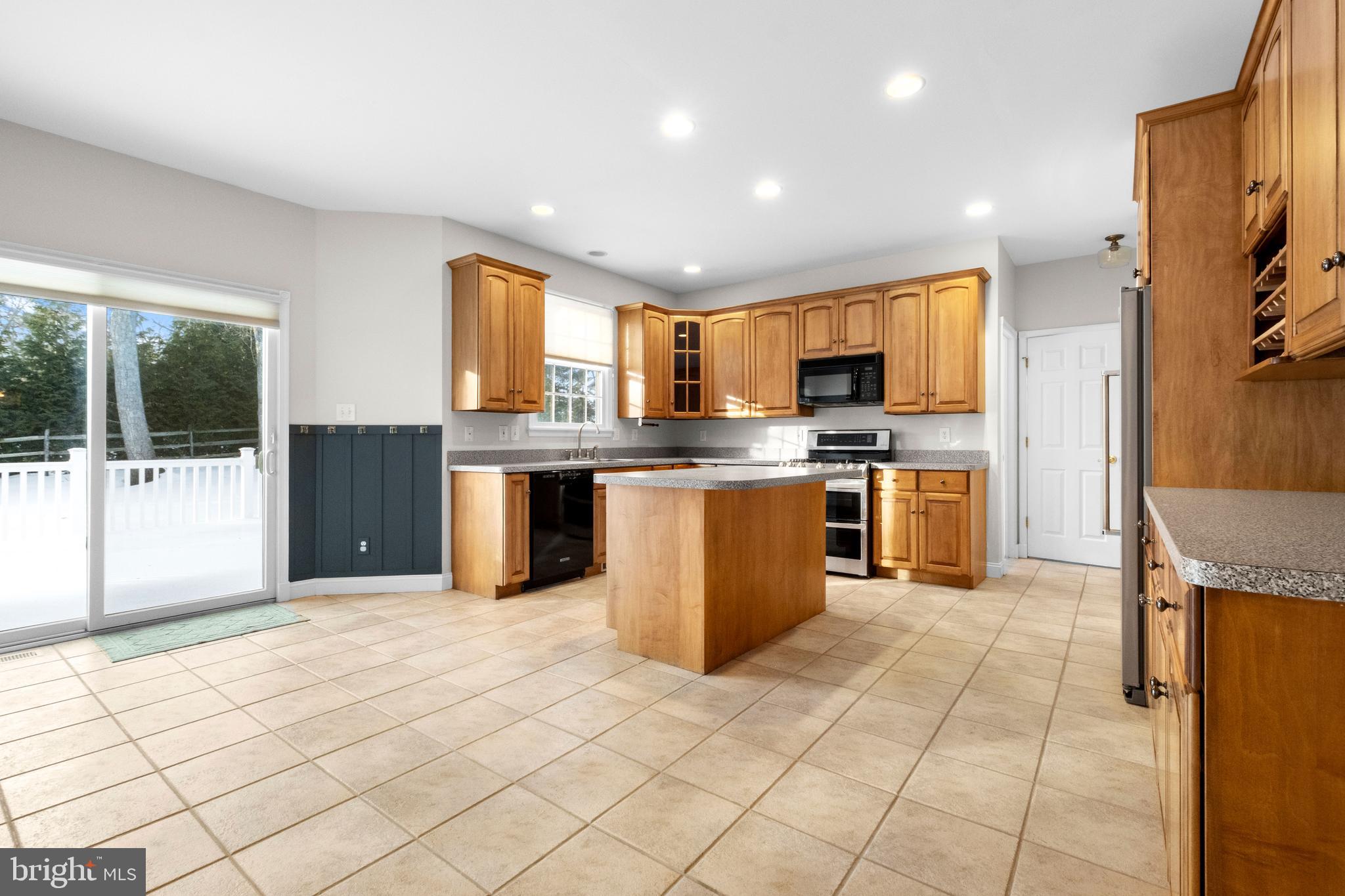1 Braddocks Mill Road Medford, NJ 08055 - Photo 16 of 61 a kitchen with stainless steel appliances granite countertop a stove top oven a sink a counter top space and cabinets