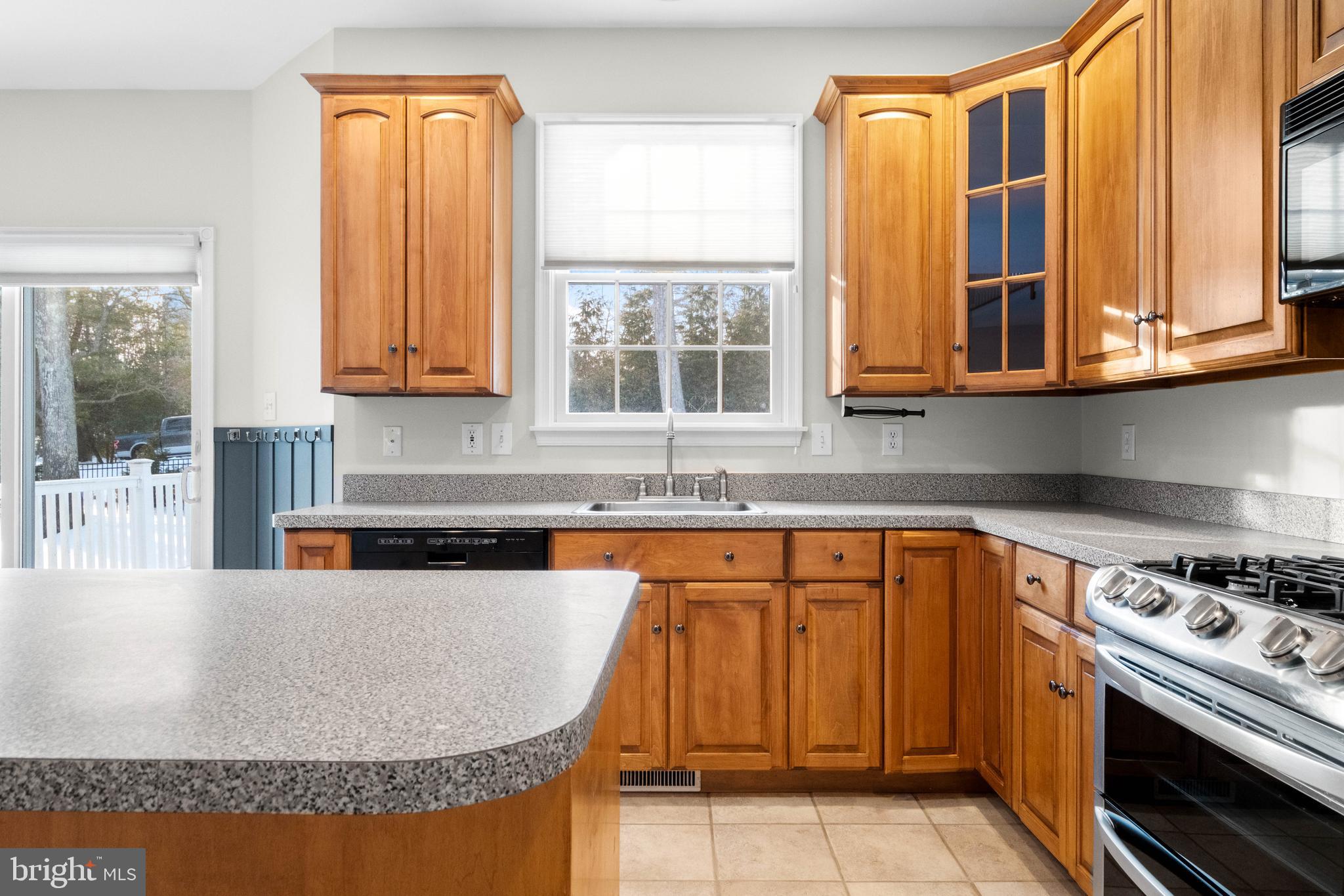 1 Braddocks Mill Road Medford, NJ 08055 - Photo 18 of 61 a kitchen with stainless steel appliances granite countertop a stove a sink and a granite counter tops