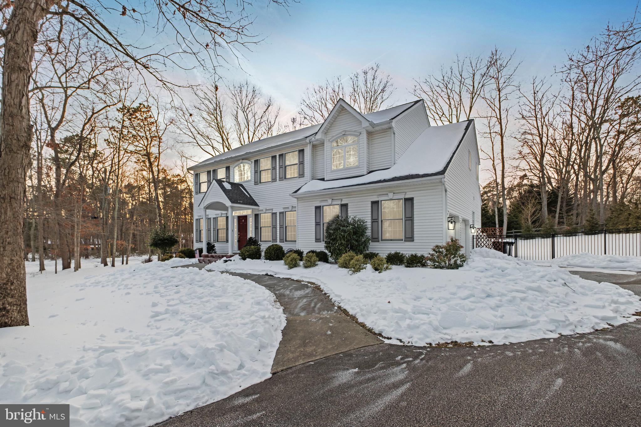 1 Braddocks Mill Road Medford, NJ 08055 - Photo 2 of 61 a view of a house with a yard covered in snow