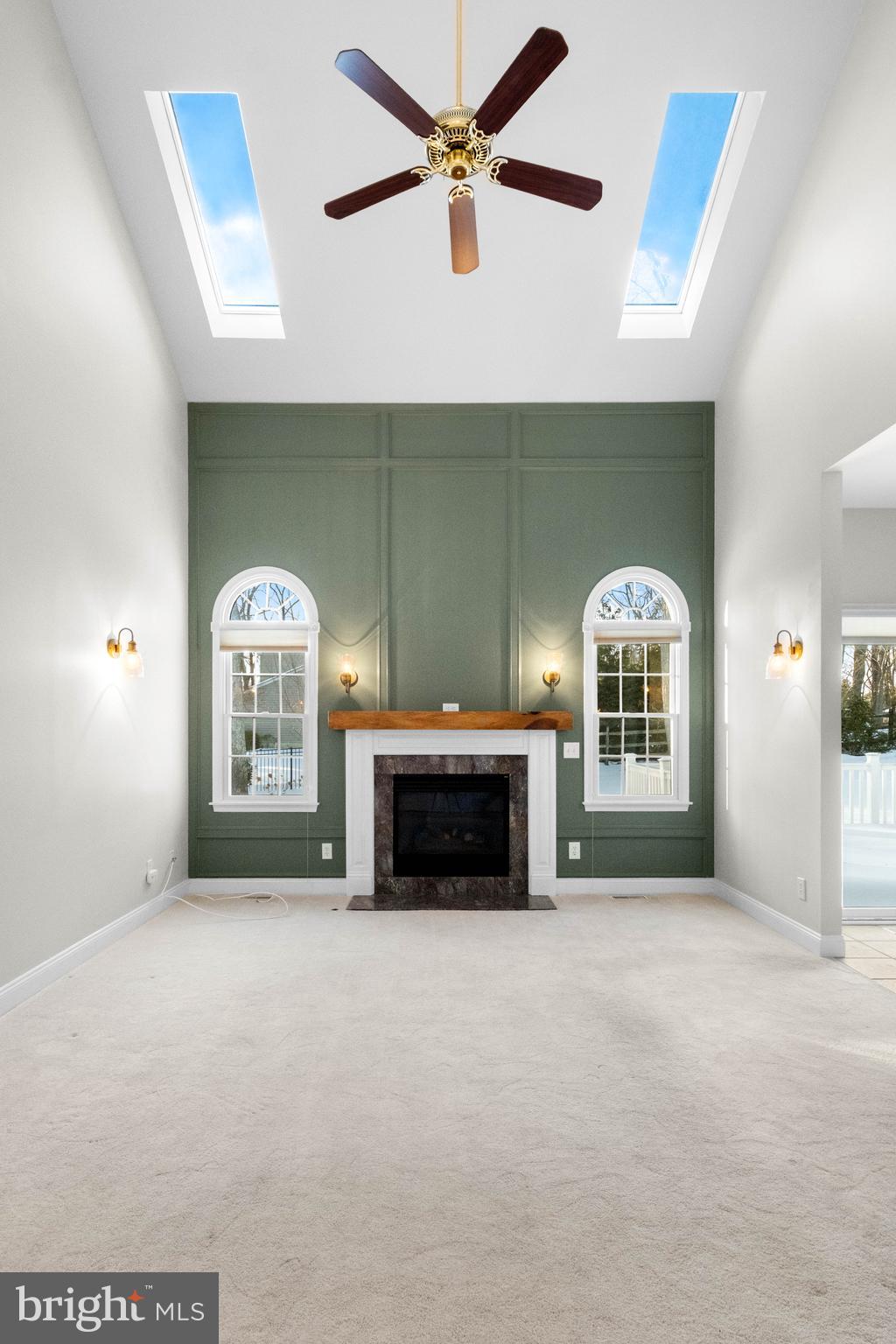 1 Braddocks Mill Road Medford, NJ 08055 - Photo 22 of 61 a living room with furniture and a fireplace