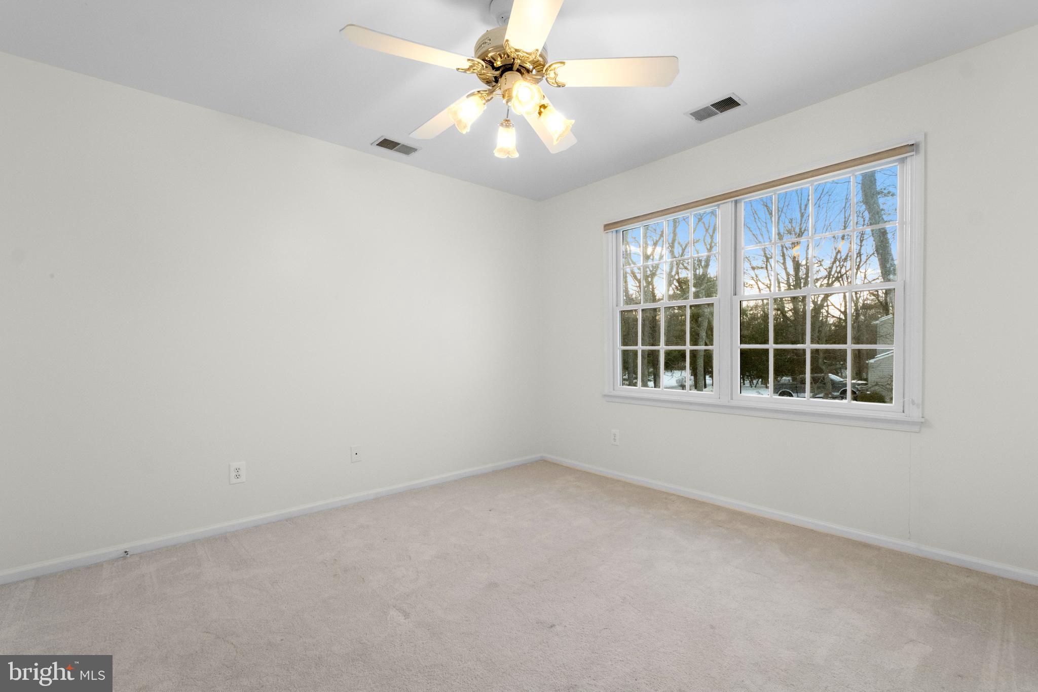 1 Braddocks Mill Road Medford, NJ 08055 - Photo 39 of 61 wooden floor in an empty room with a window