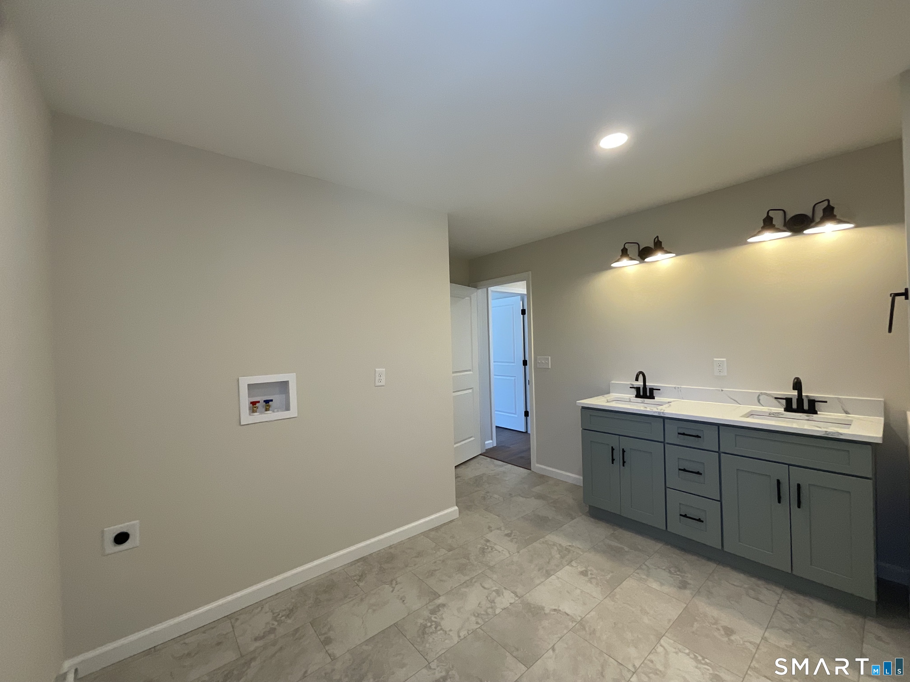277 Moosup Pond Road Plainfield, CT 06354 - Photo 16 of 25 a bathroom with a sink and mirror