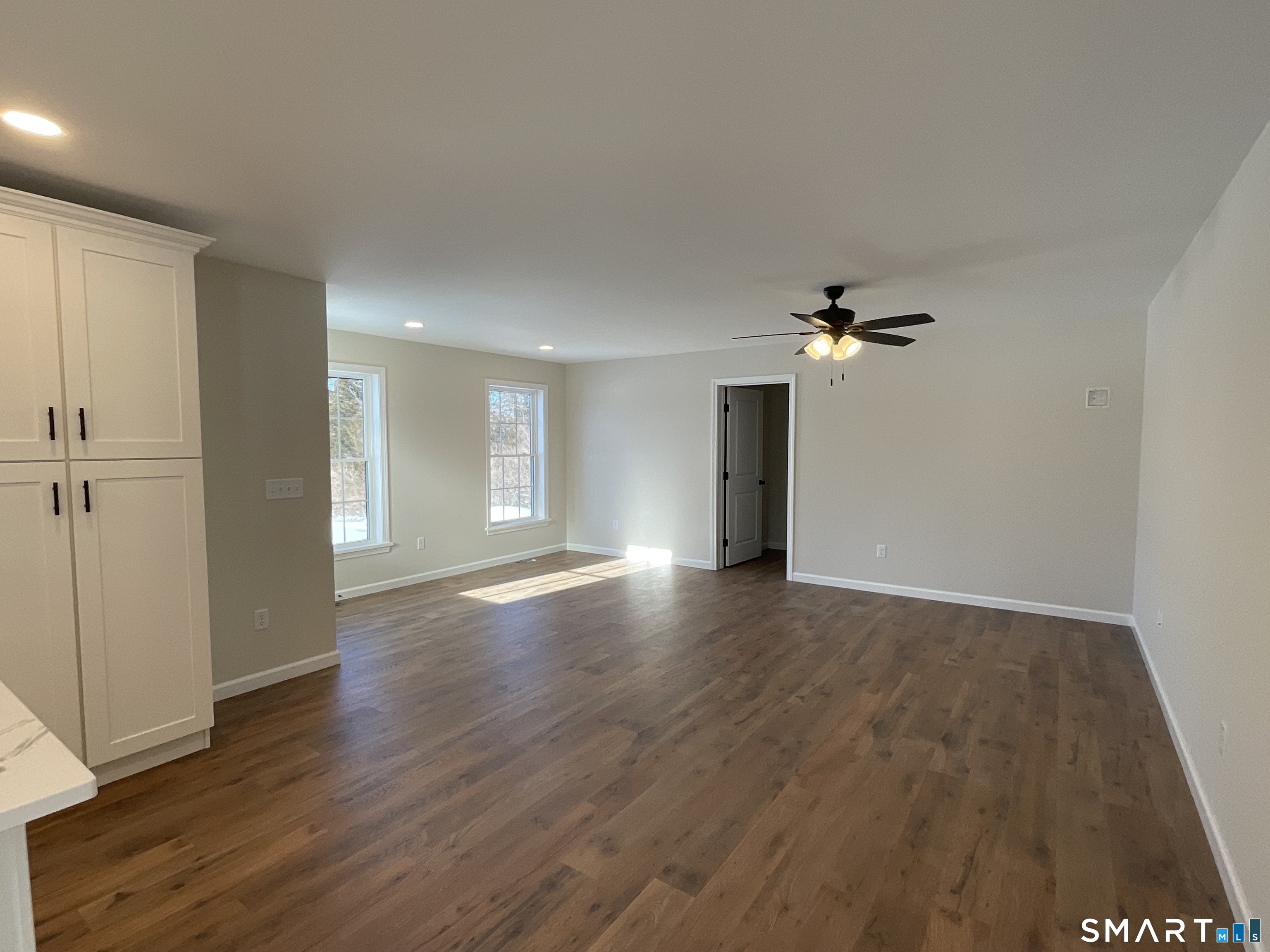 277 Moosup Pond Road Plainfield, CT 06354 - Photo 6 of 25 a view of empty room with wooden floor