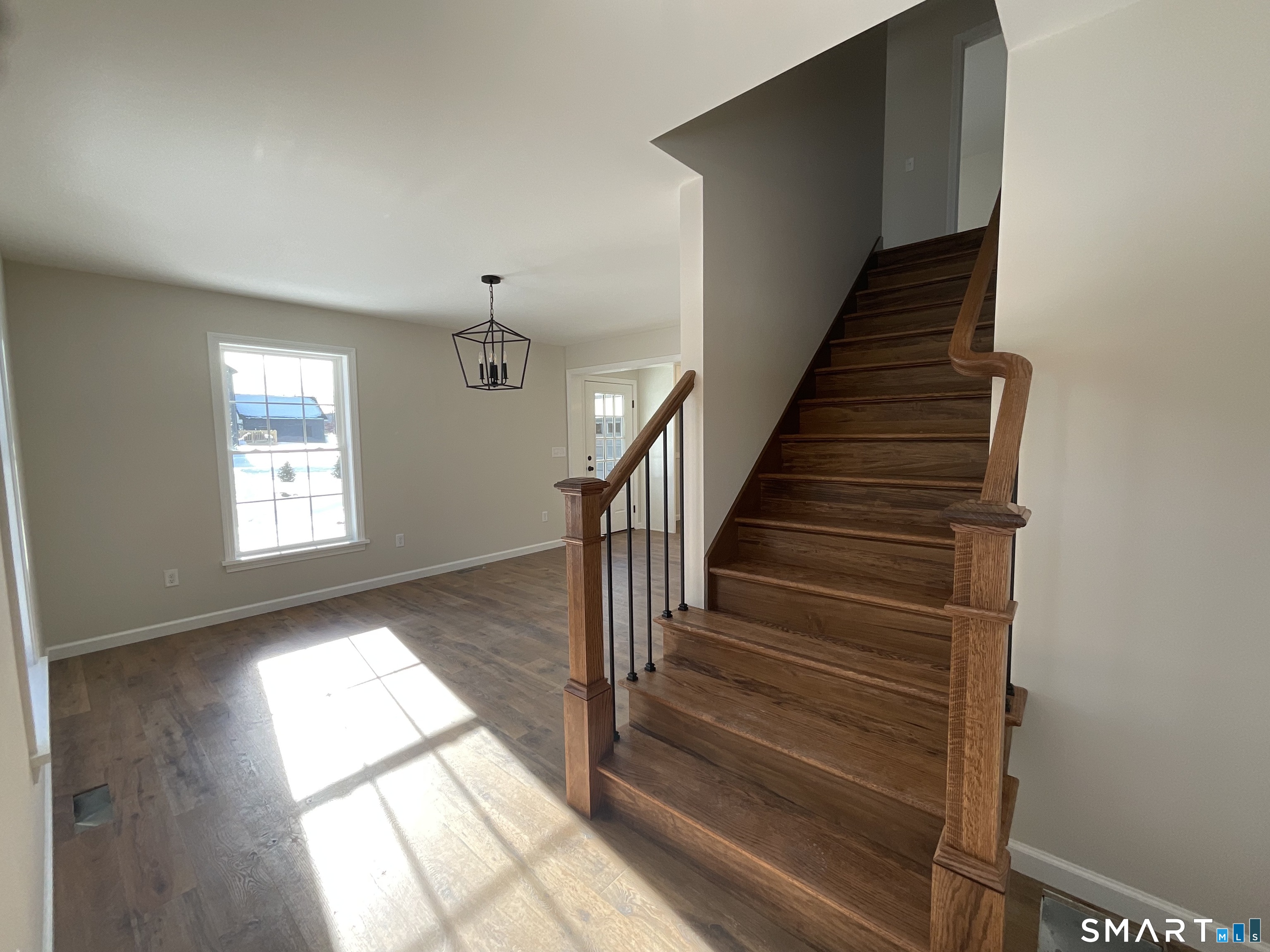 277 Moosup Pond Road Plainfield, CT 06354 - Photo 10 of 25 a view of entryway and hall with wooden floor