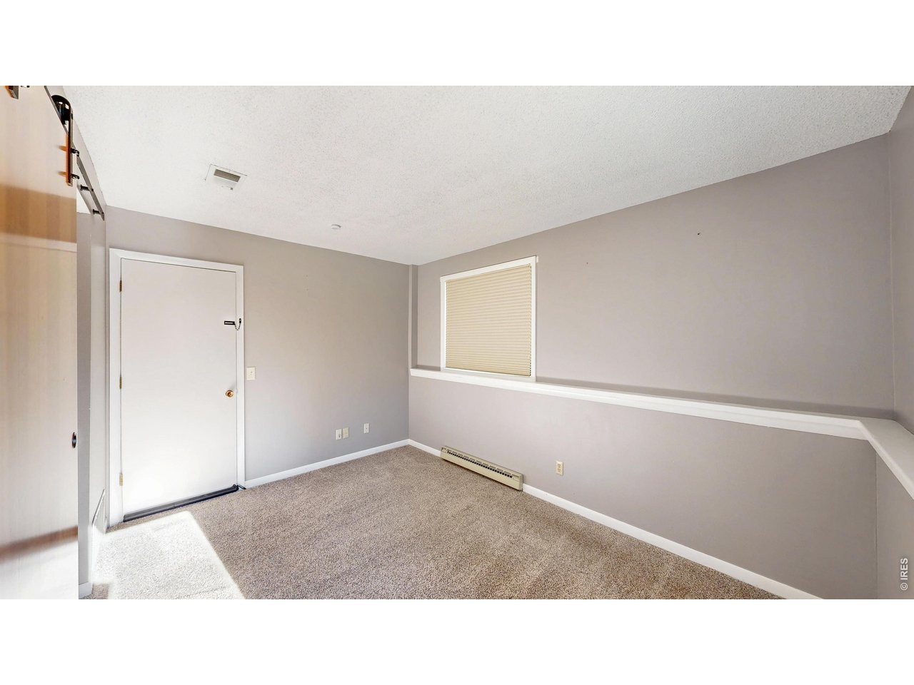 200 Riverside Drive, Unit 1 Estes Park, CO 80517 - Photo 18 of 27 a open hall with a ceiling fan